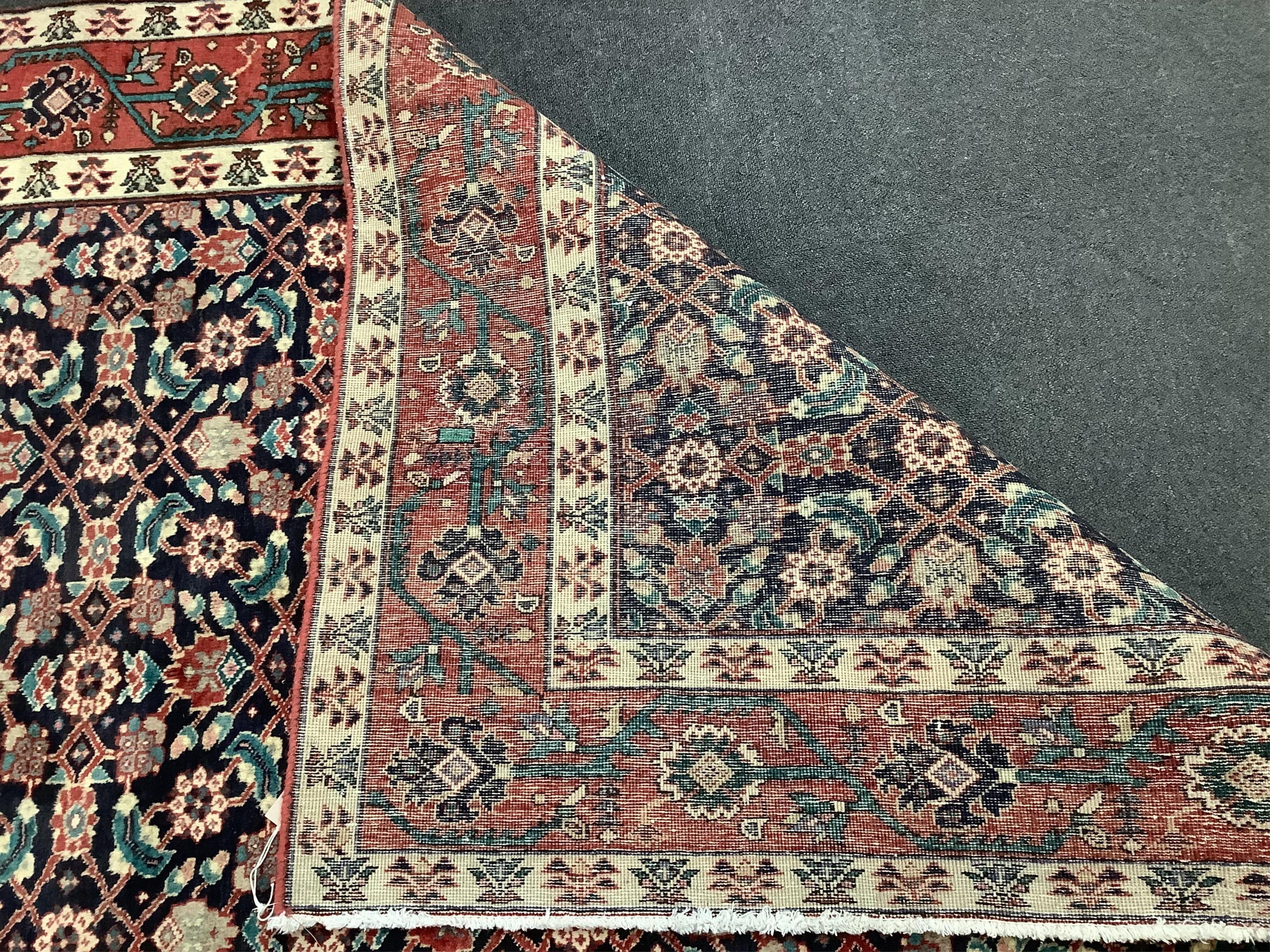 A Hamadan blue ground hall ground carpet, 430 x 160cm. Condition - good